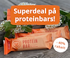 Proteinbar i orange förpackning med texten "Superdeal på proteinbars, -40%".